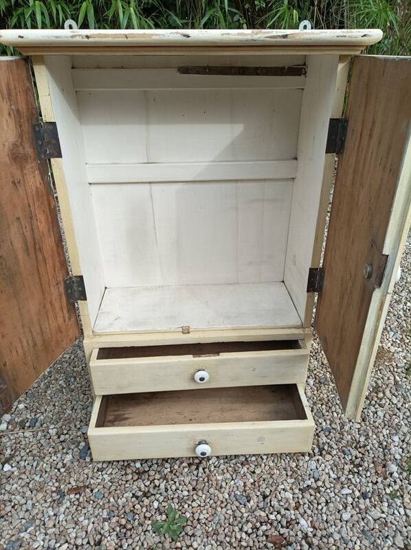 Solid beige wood cabinet with door drawers