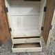 Armoire bois massif beige patiné tiroirs porte
