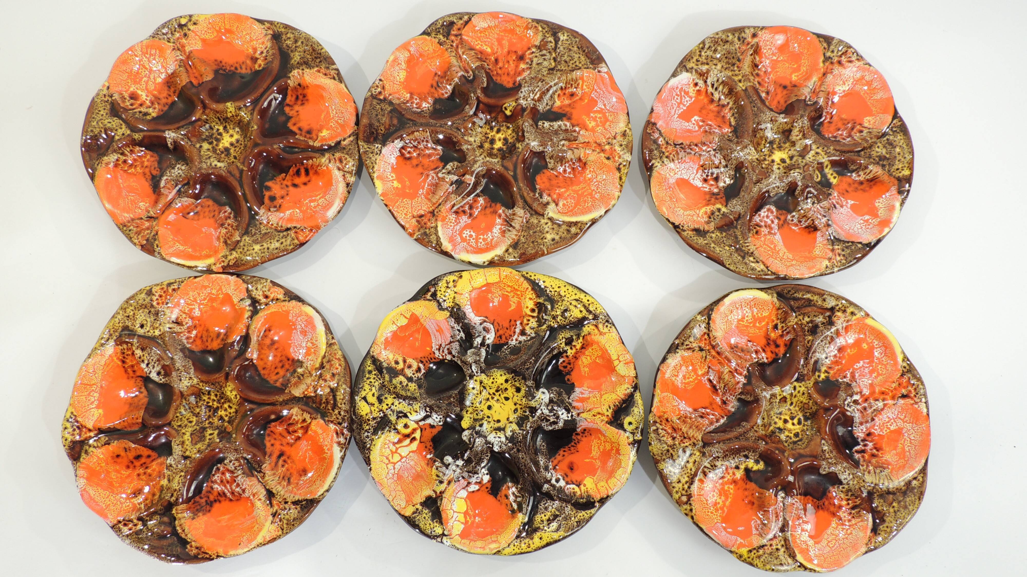 Lot six oyster plates /slip/faience