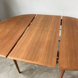 Scandinavian round teak table with extension