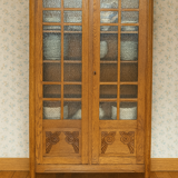 Small Art Deco period oak cabinet with glass front