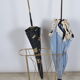 Golden metal umbrella door