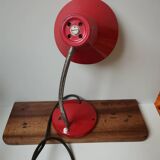 Articulated vintage red metal factory desk lamp