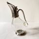 Ewer, decanter in silver-plated metal and glass