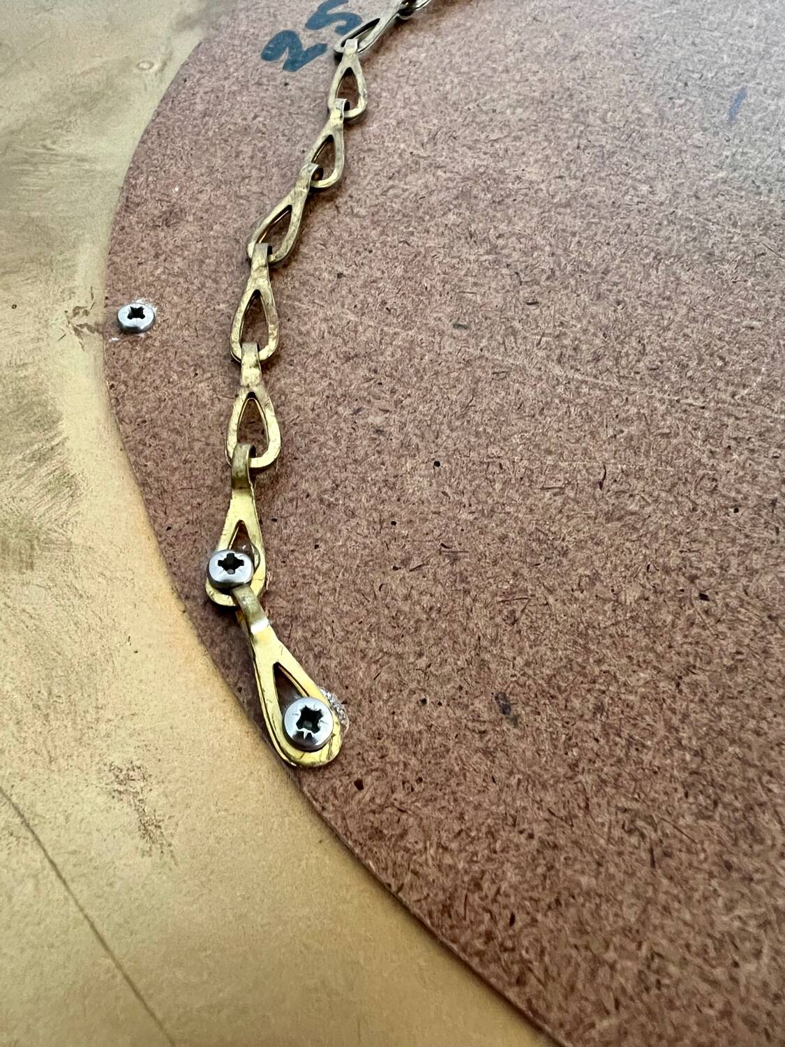 Old large golden sun mirror with rounded witch's eye in vintage resin from the 70s