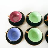 Set of 6 black and colored earthenware cups and saucers, 1950