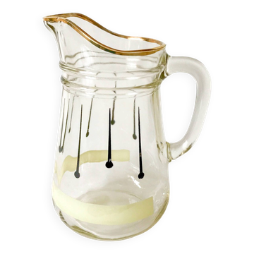 glass pitcher with black psyche patterns with gold edging from the 60s and 70s