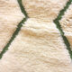 Magnificent Berber carpet Béni Ouarain green and white with diamonds and braided border
