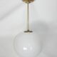 Mid-Century Modern pendant light, 1950s, brass and glass, 25 cm globe