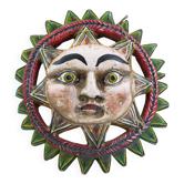 Vintage Mexican sun mask in hand-carved wood with brightly colored lacquer, traditional retro decorative wall art from South America