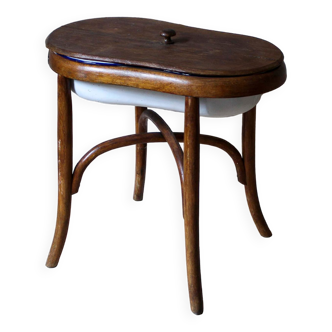 Bidet in curved wood and enamelled metal
