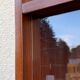 Vintage 1950s teak glass wall library