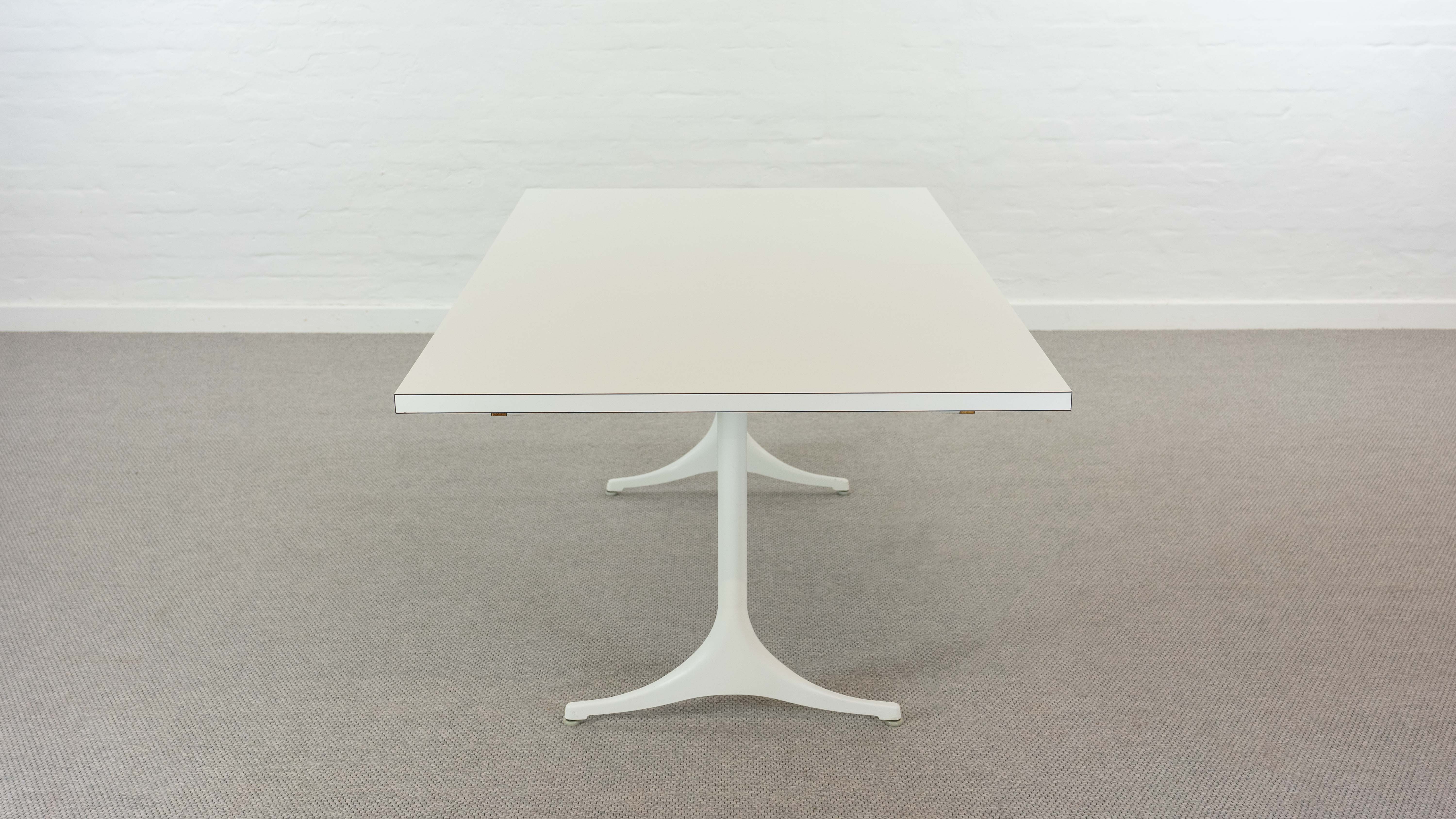 Extendable pedestal dining table by George Nelson for Herman Miller