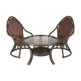 Vintage manou rattan set of 2 armchairs and table with glass top made in the 1970s