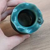 Small handmade turquoise pottery.