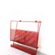 Vintage magazine rack in red lacquered perforated metal from the 70s