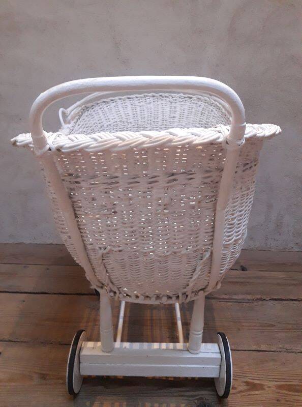 Wicker and painted wood baby cradle