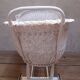 Wicker and painted wood baby cradle