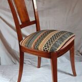 2 varnished solid wood chairs with "ethnic" padding