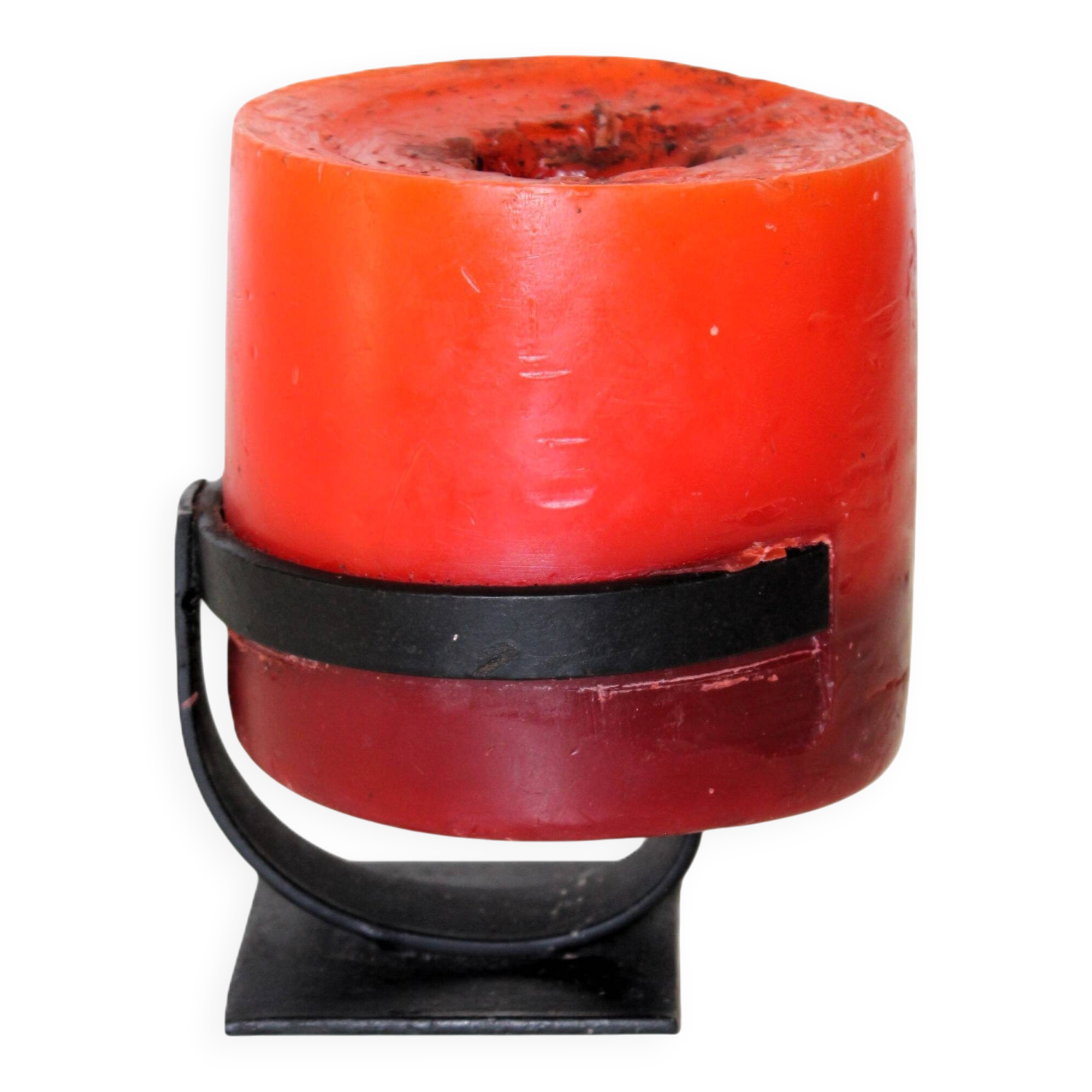 1970 wrought iron candlestick with its period coloured candle.
