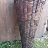 Old grape pickers basket woven wicker vintage wine vines decoration