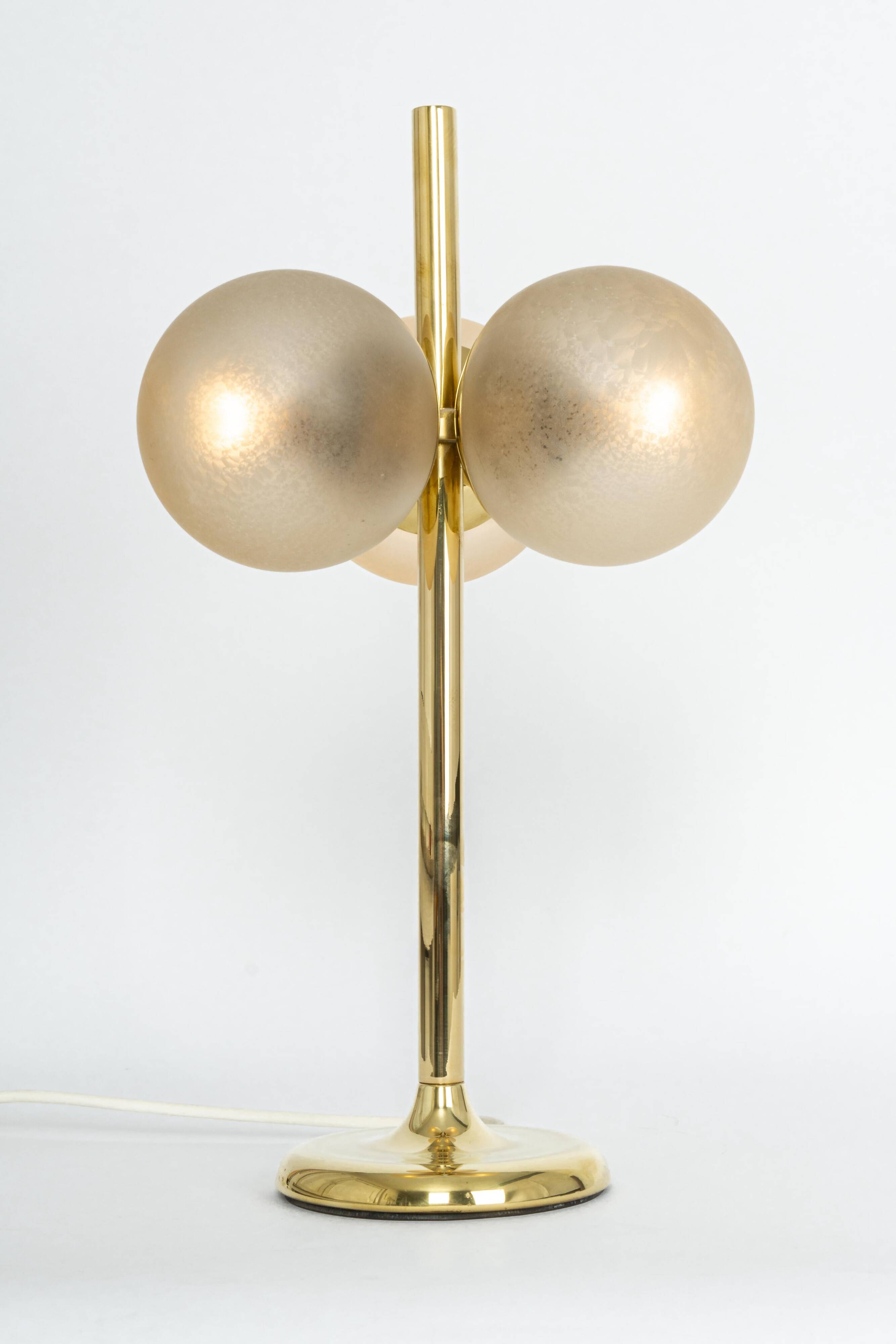 Pair of large brass table lamps by Kaiser, Germany, 1970s.
