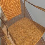 Wicker armchair and wrought iron