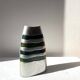 Vintage brushed aluminium vase with green stripes.