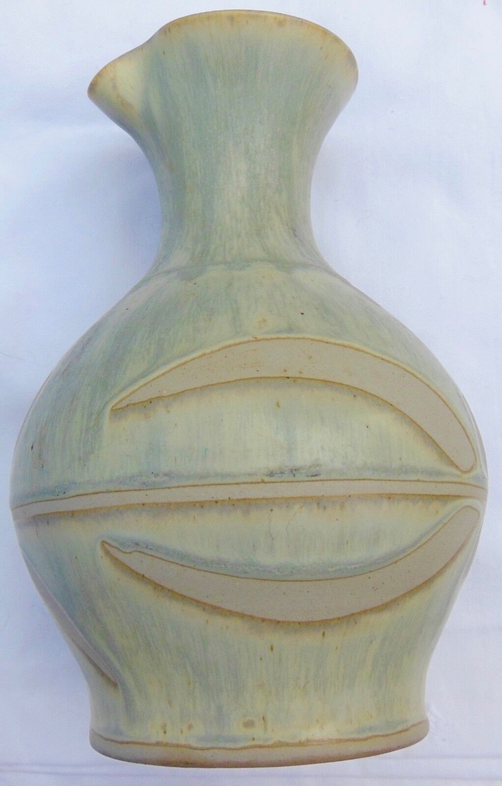 Pitcher or vase in glazed ceramics, signature to identify