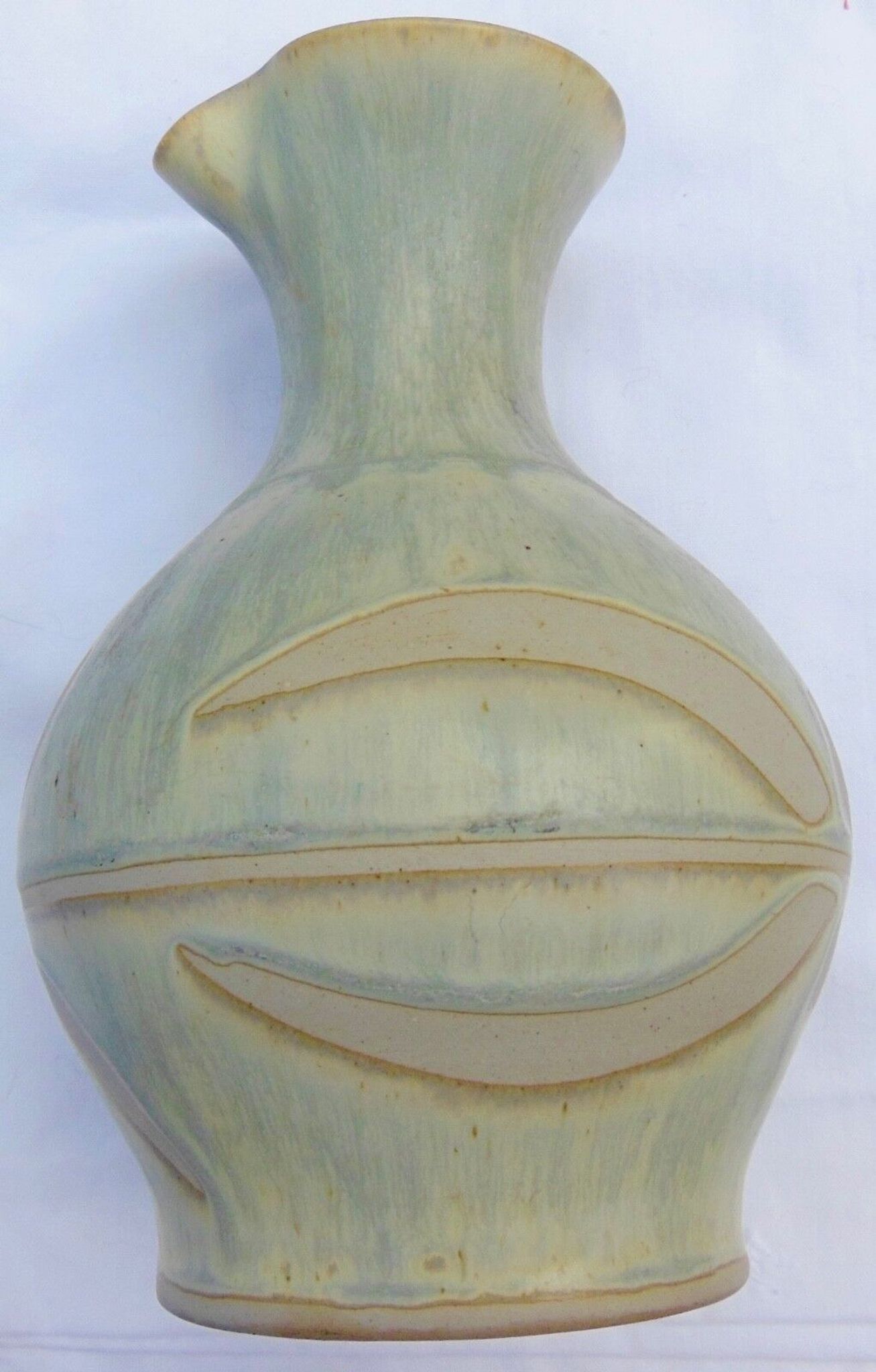Pitcher or vase in glazed ceramics, signature to identify