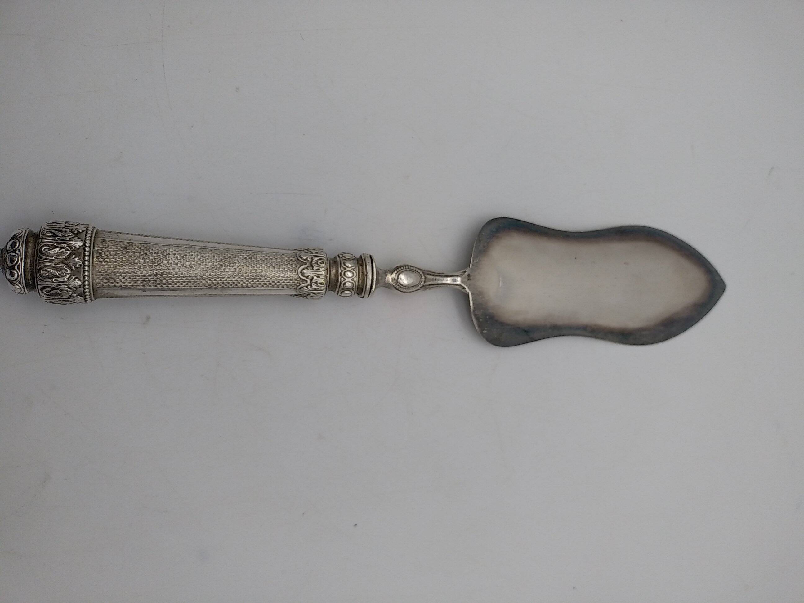 Silver and silver-filled pie server. 19th century.
