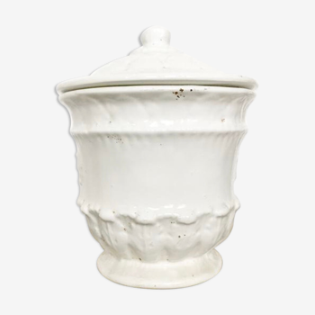 Vintage covered pot in white earthenware molded with lions and friezes