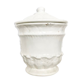 Vintage covered pot in white earthenware molded with lions and friezes