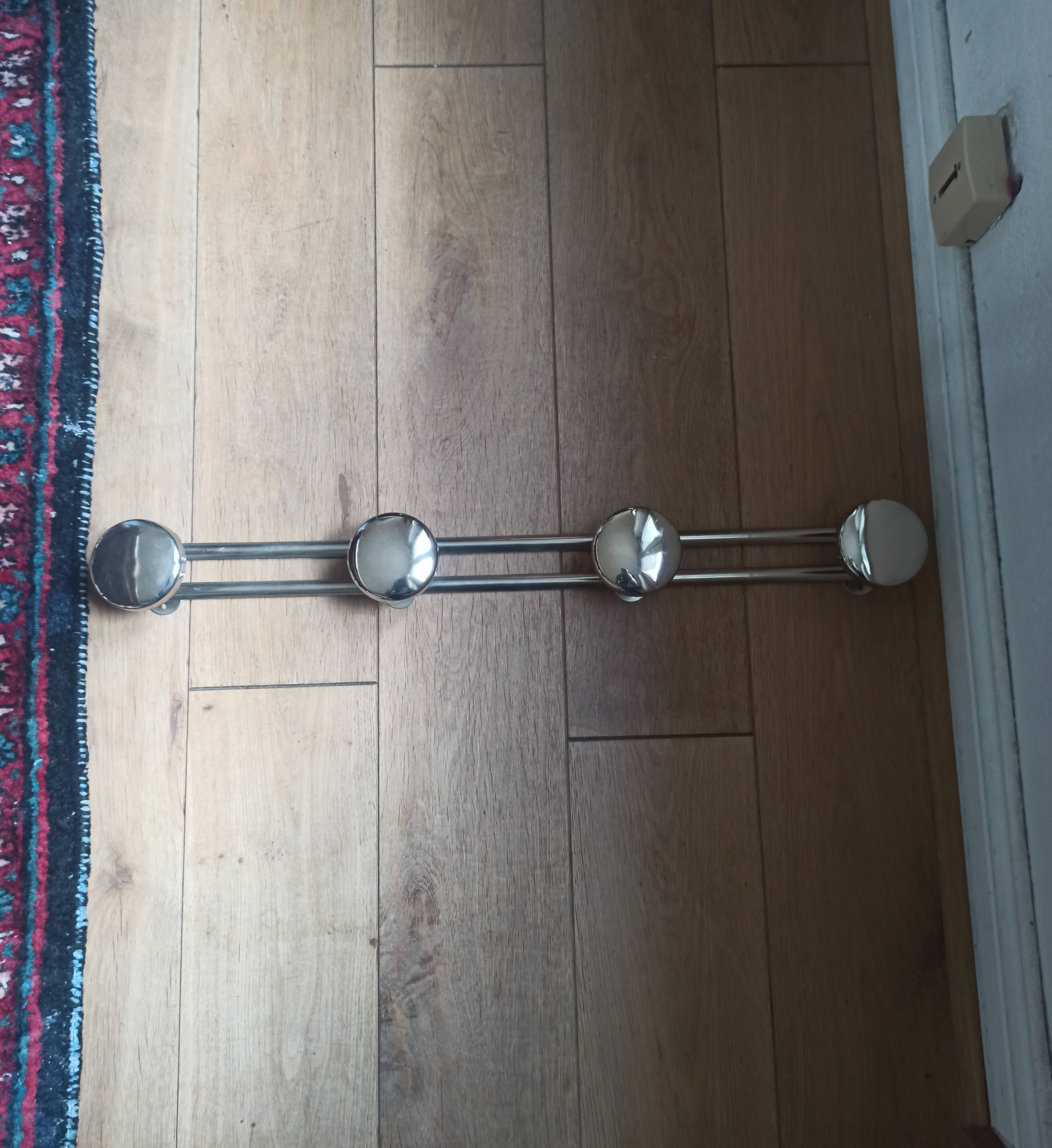 Metal wall coat rack