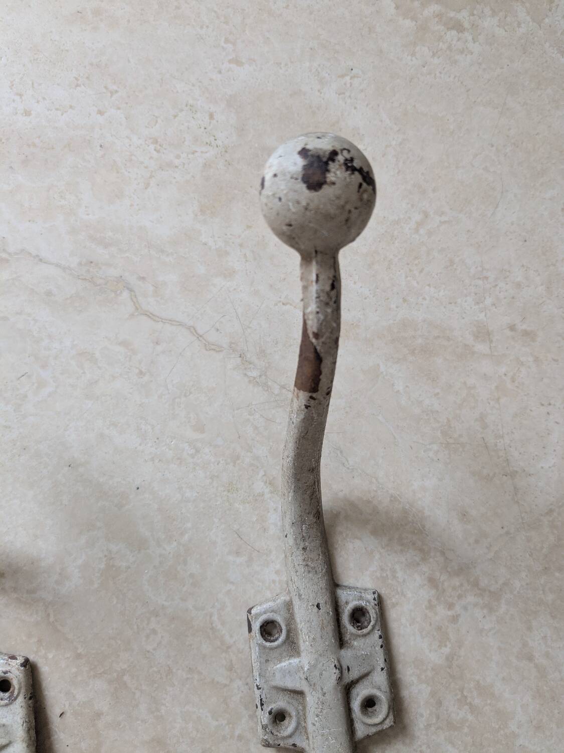 Two vintage coat hooks