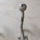 Two vintage coat hooks