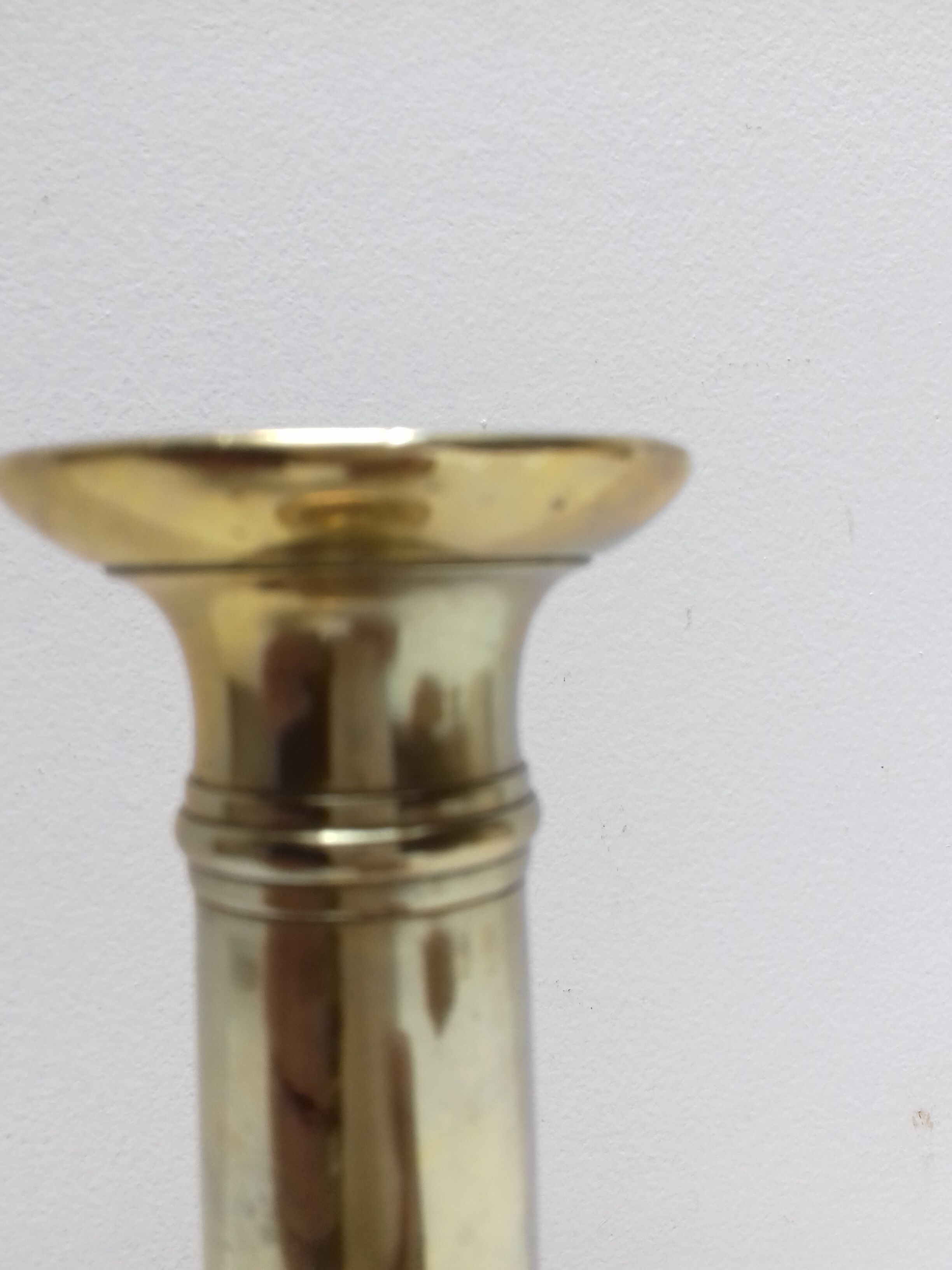 Pair of old brass candlesticks