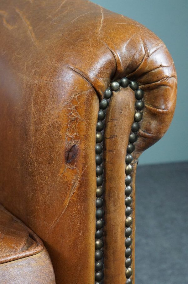 Fauteuil club en cuir de mouton robuste