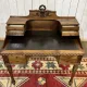 Louis XVI style desk from the late 19th century in walnut with a leather top.