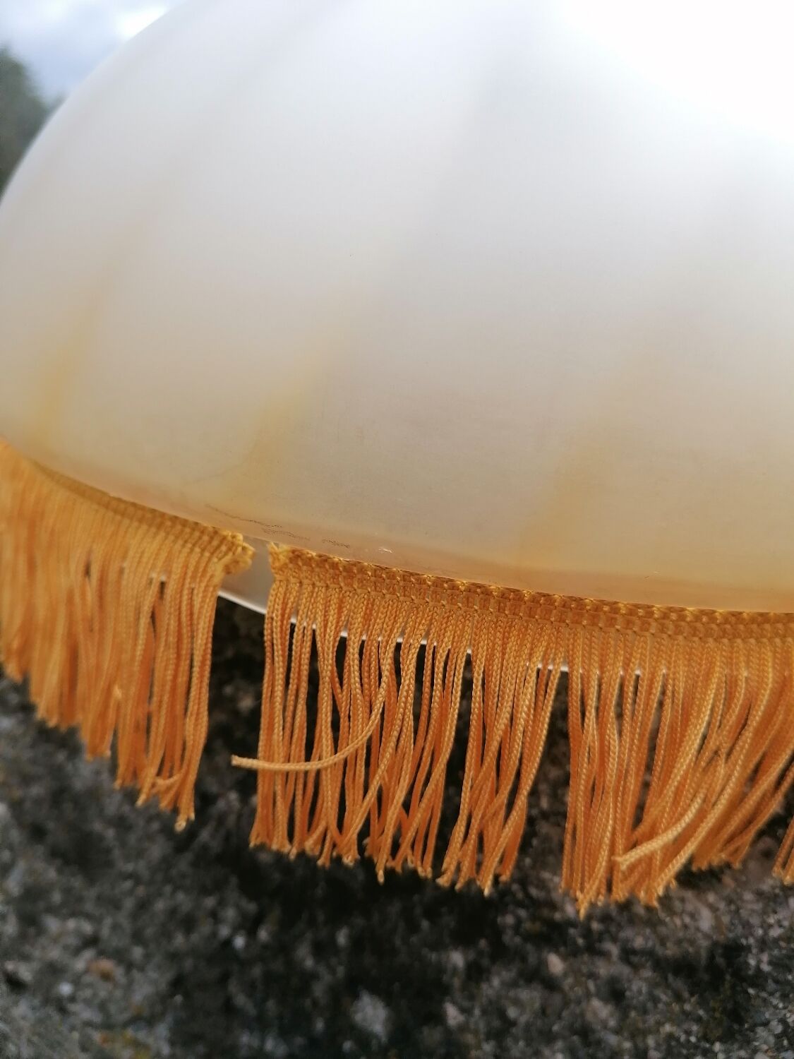 Vintage suspension with frosted glass fringes.