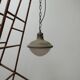 Patinated metal and glass Holophane pendant light