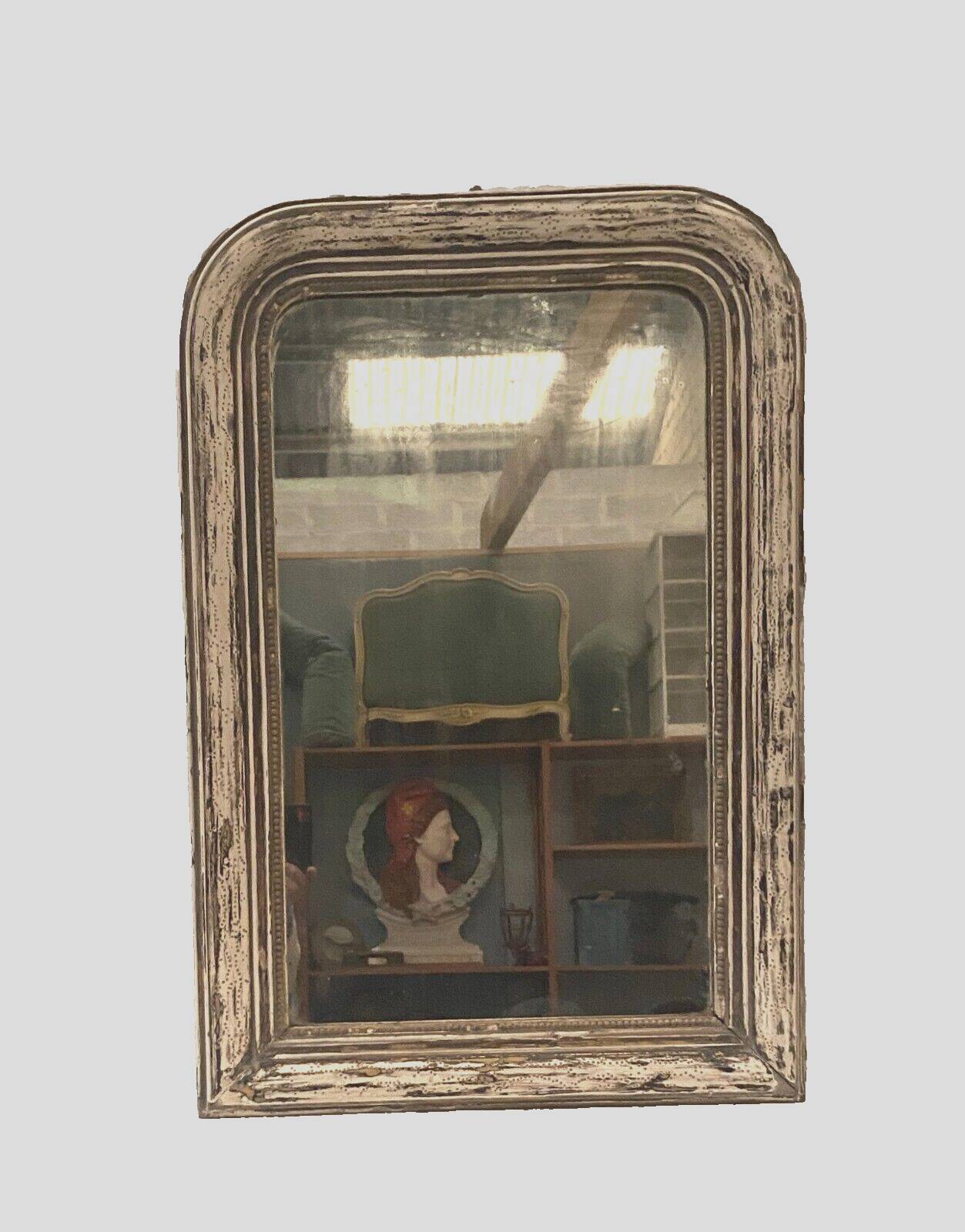Louis Philippe mirror in wood and patinated stucco 19th century
