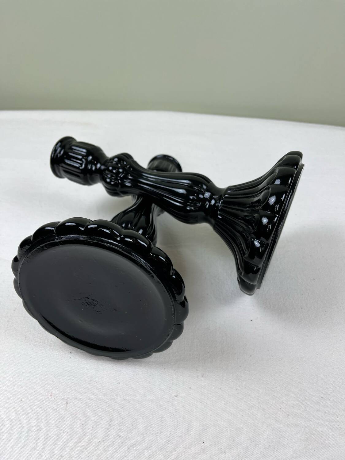 Pair of black opaline candlesticks