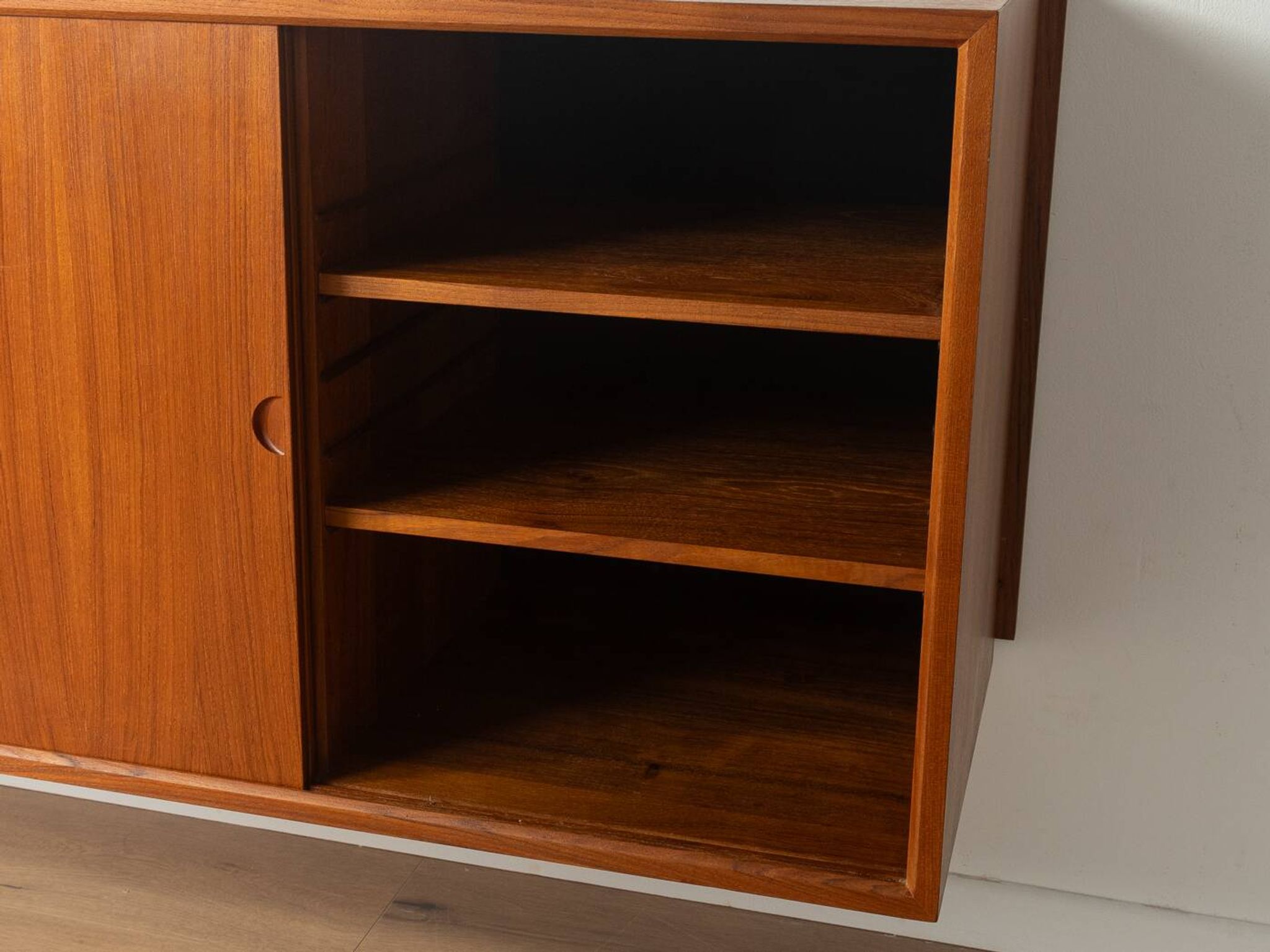 Classic shelving system from the 1960s in teak veneer by Poul Cadovius for Cado