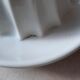 White earthenware citrus press
