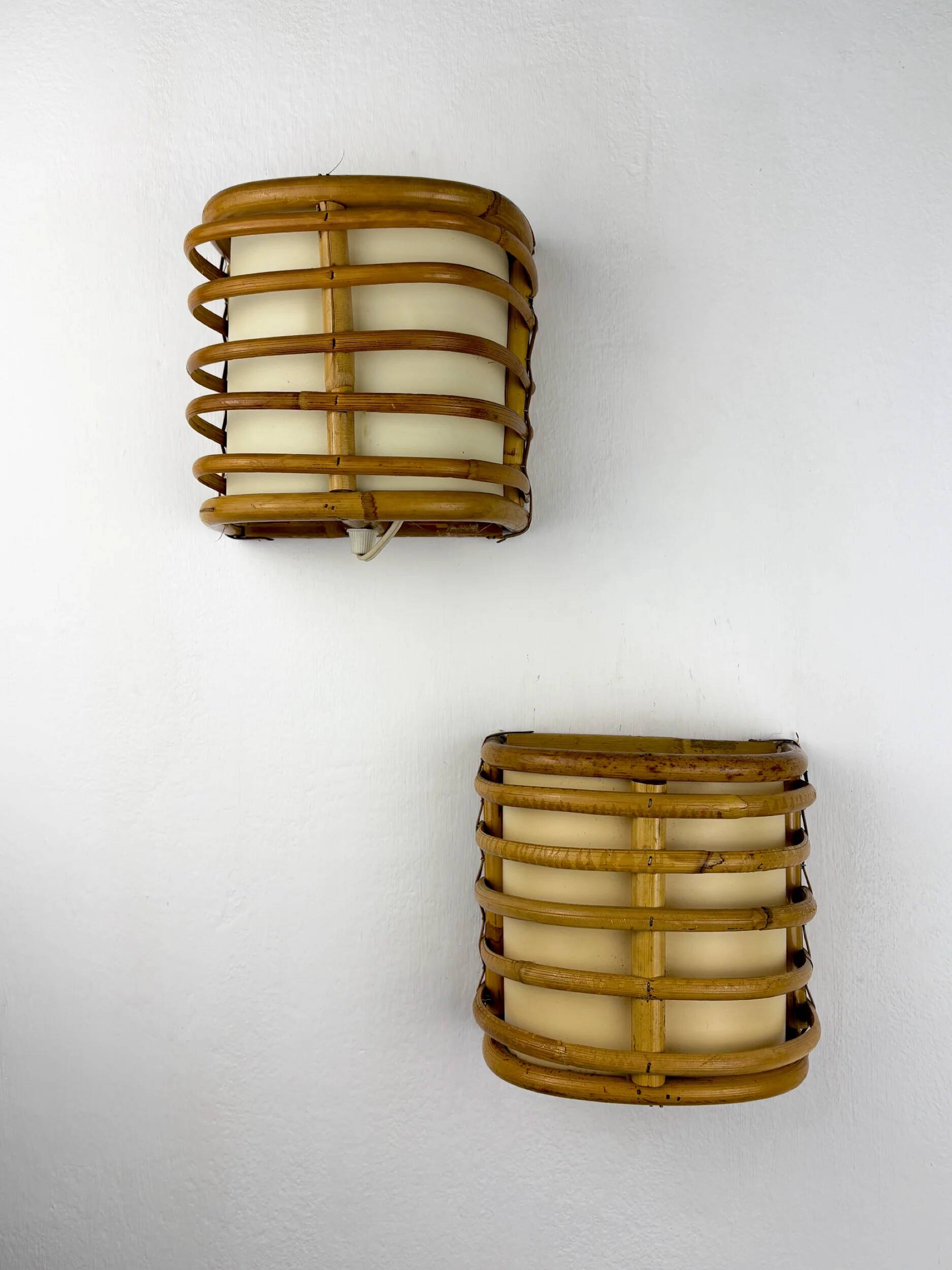 Pair of mid-century rattan wall sconces, 1960s, Italy