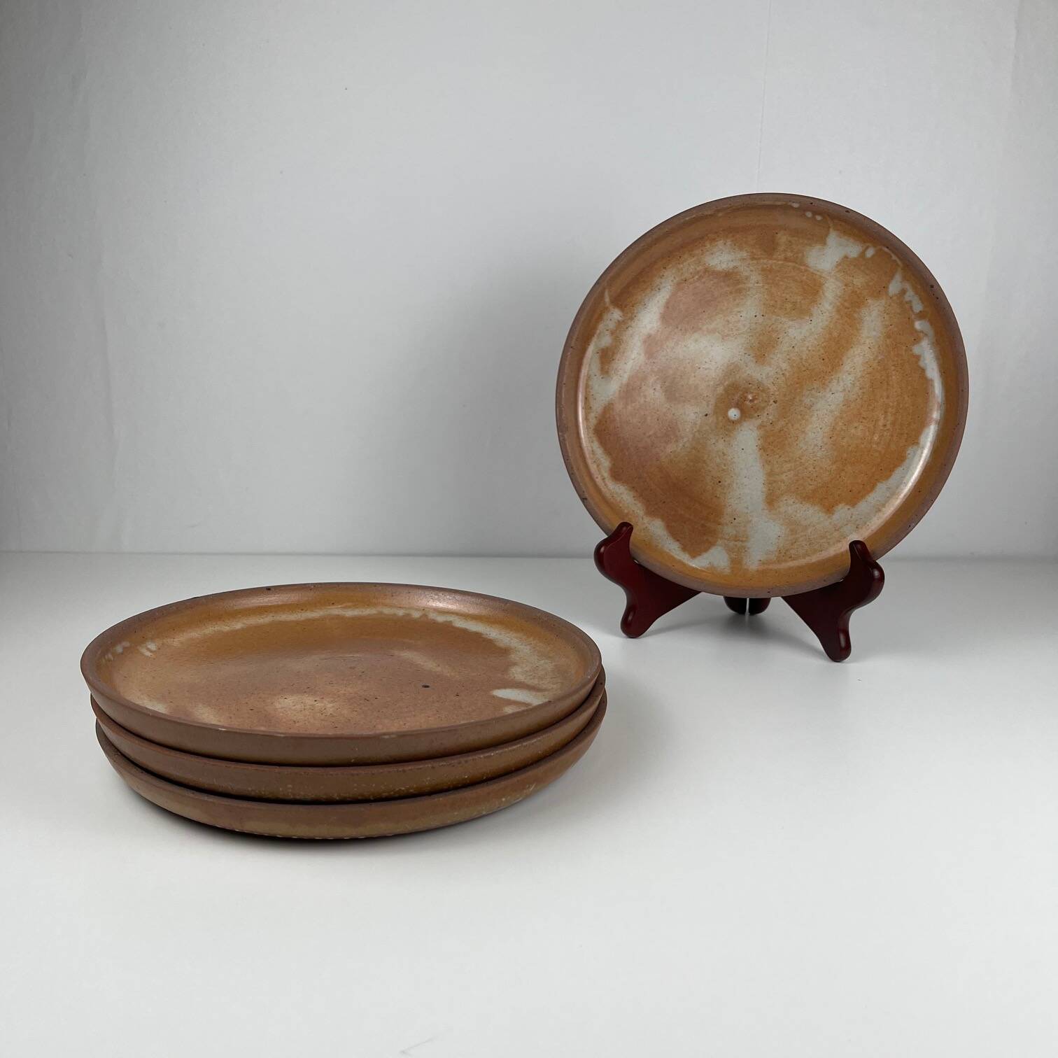 Set of 4 brutalist terracotta plates, brown/red tone, 1970