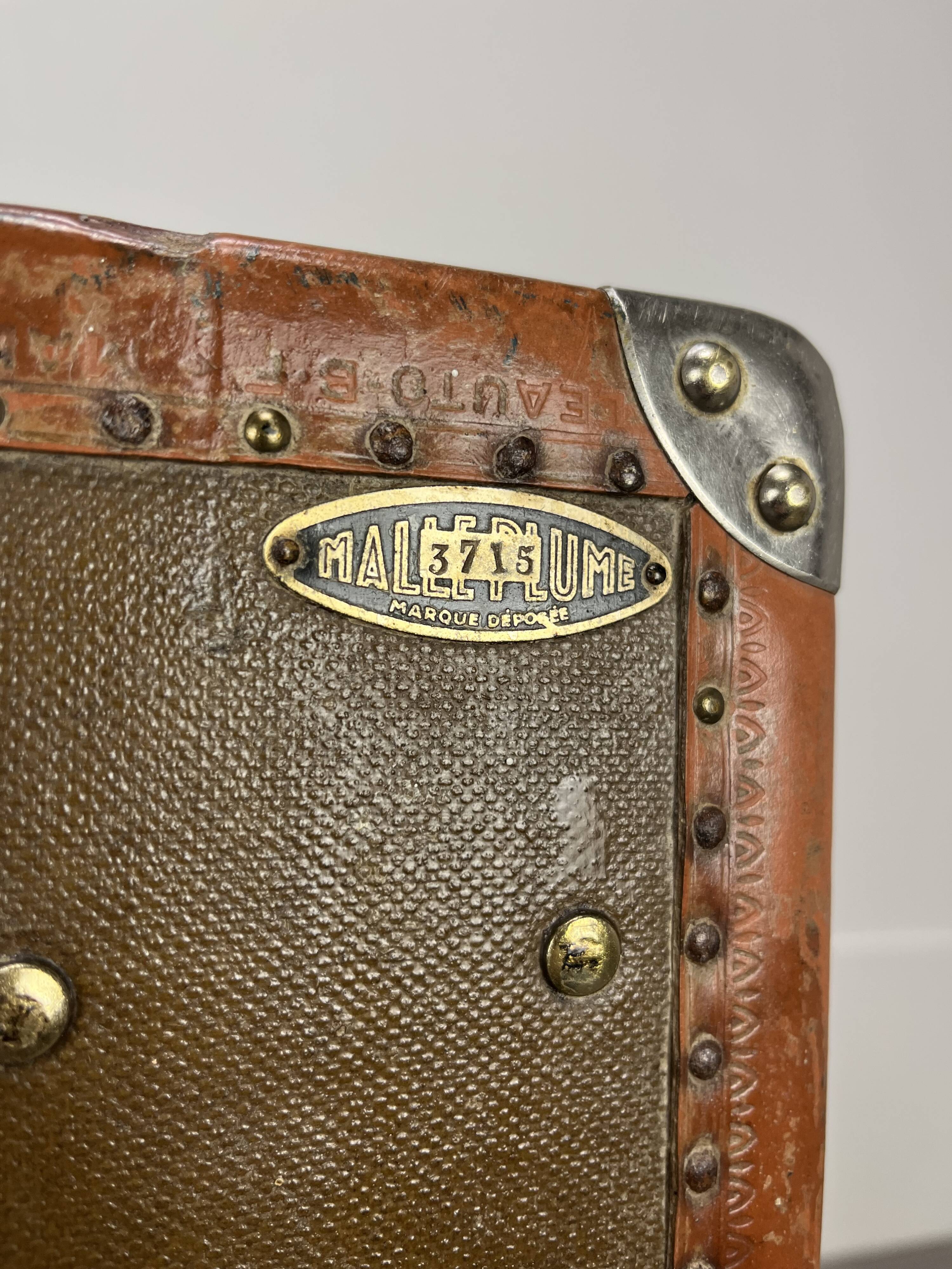 “MallePlume Paris” cabin trunk