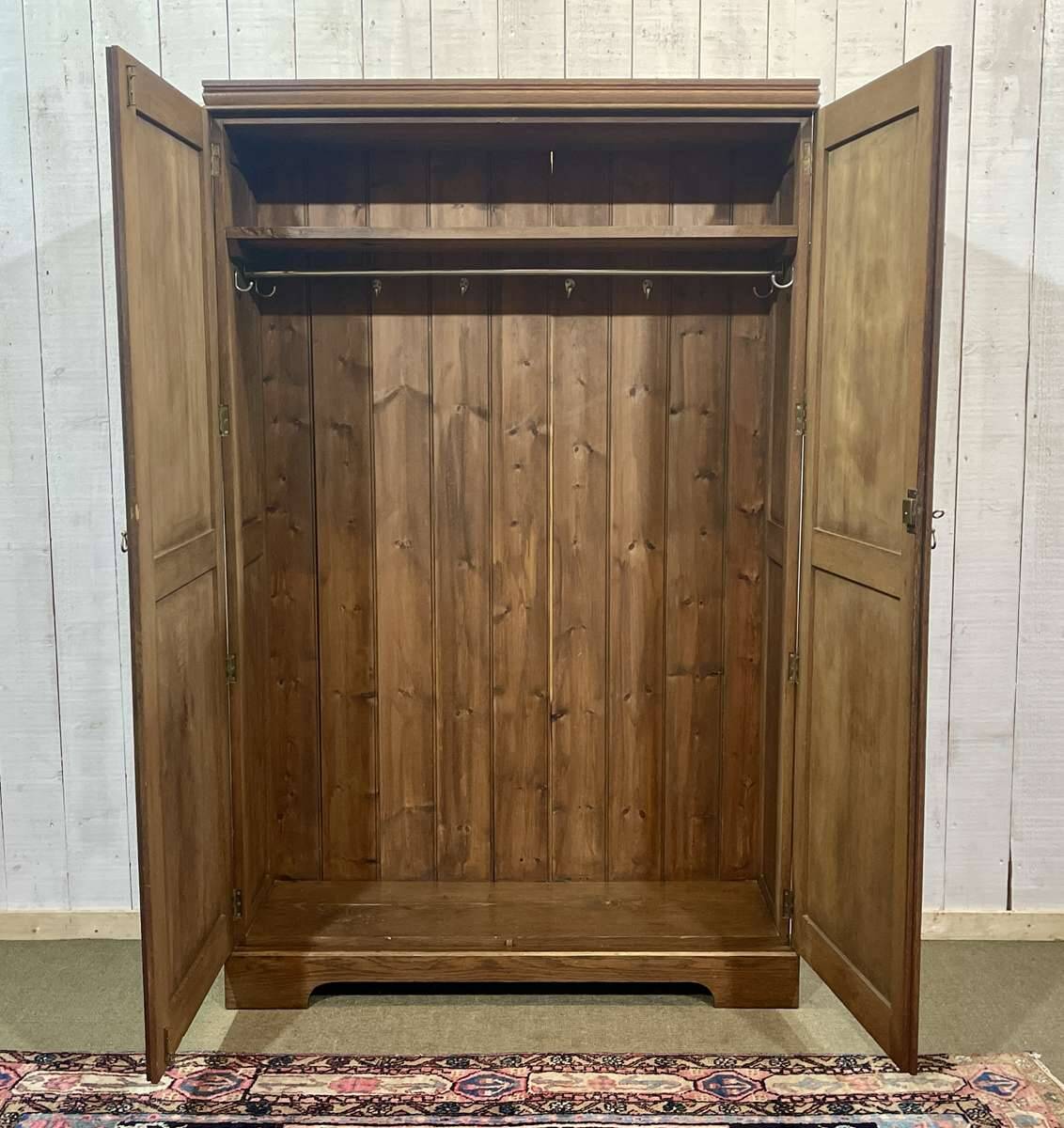 English oak wardrobe from the early 20th century.