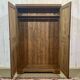 English oak wardrobe from the early 20th century.